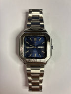 Bartlett 1954 Novella watch, square stepped case with a blue lined dial on a silver steel bracelet