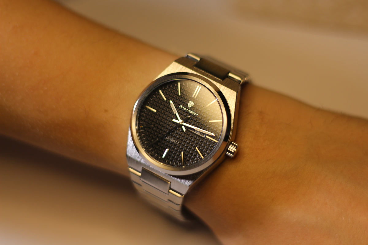 Bartlett 1954 Orin with a black dial worn on the wrist, side view
