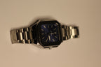Bartlett 1954 Novella, square case and blue dial on a steel bracelet, side view