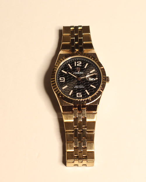 Bartlett 1954 Coralis, rose gold case and bracelet with a black honeycomb dial and fluted bezel, front view