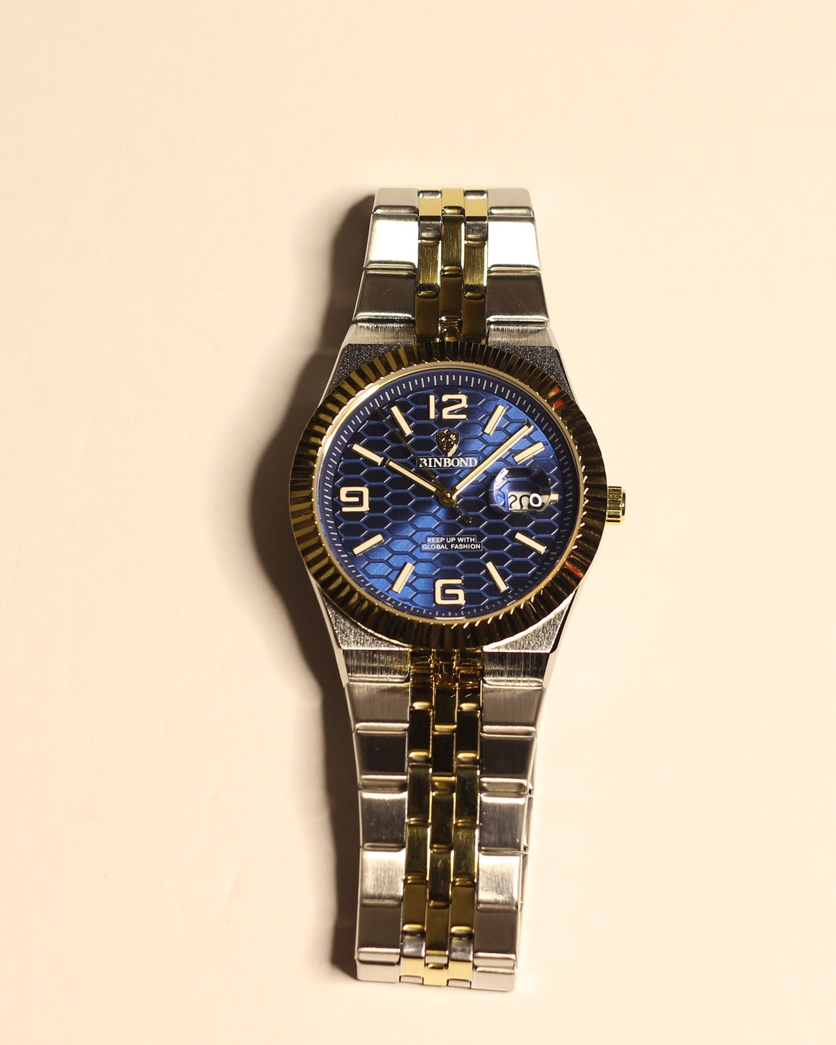 Bartlett 1954 Coralis, two-tone silver and gold bracelet with a blue honeycomb dial and gold fluted bezel, front view