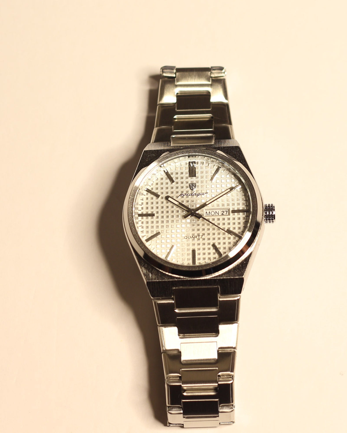Bartlett 1954 Orin, silver steel case and bracelet with a white textured dial and day-date, front view