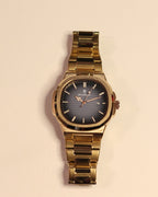 Bartlett 1954 Rivant, rose gold case and bracelet with a grey gradient dial, front view