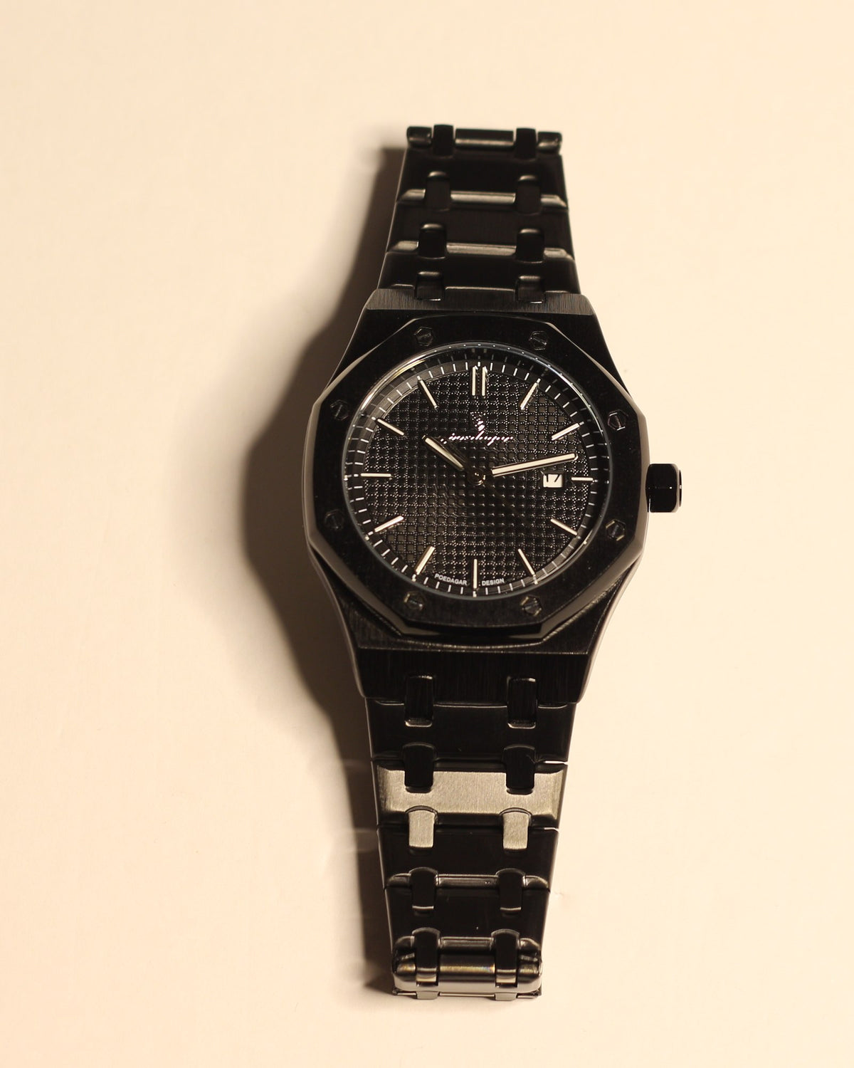 Bartlett 1954 Serov, black octagonal case and integrated black bracelet with a black textured dial, front view