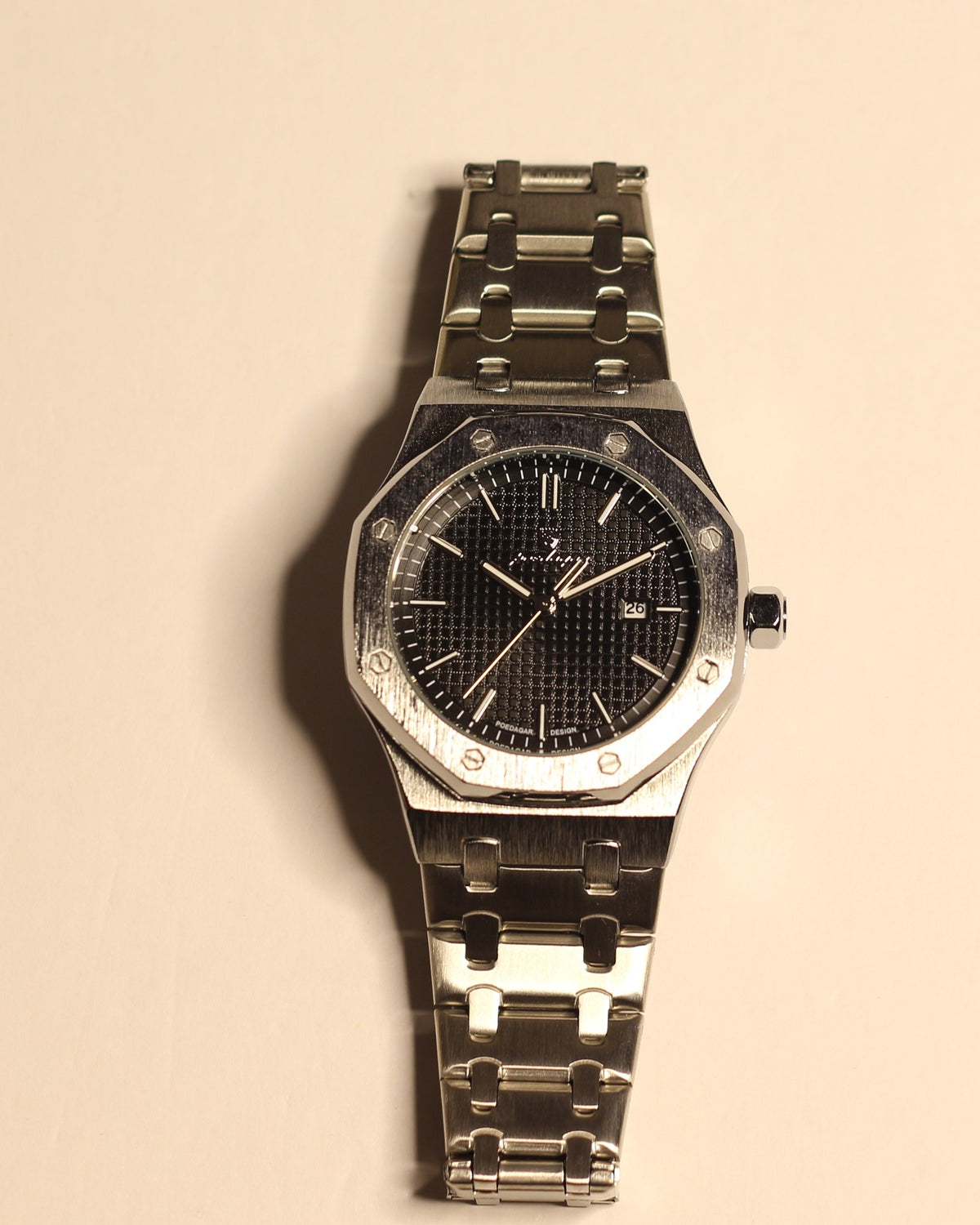 Bartlett 1954 Serov, silver octagonal case with a black textured dial, front view
