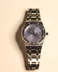 Bartlett 1954 Serov, silver octagonal case with a blue textured dial, front view