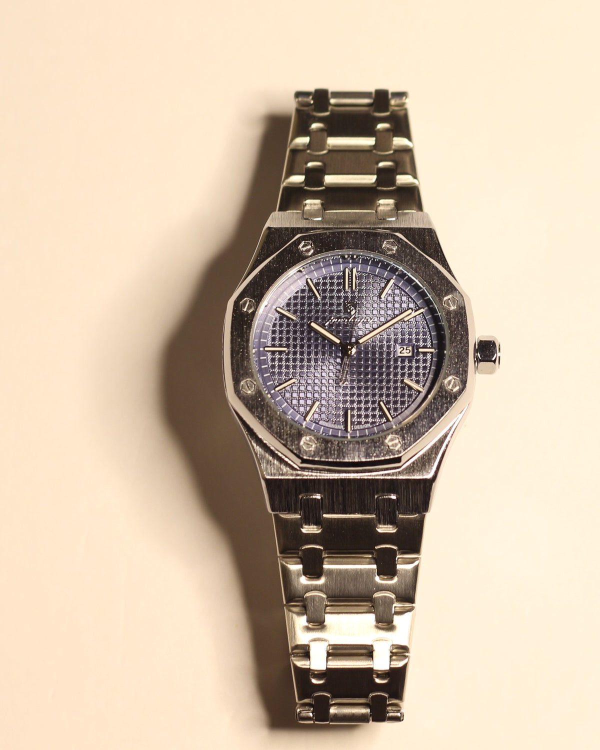 Bartlett 1954 Serov, silver octagonal case with a blue textured dial, front view