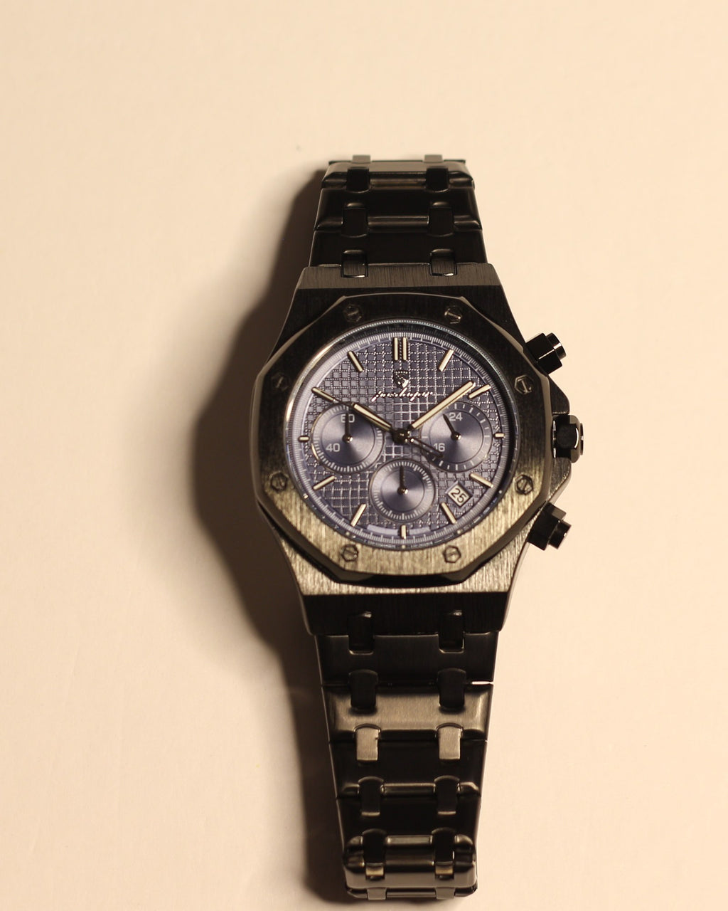 Bartlett 1954 Serov Pro II chronograph, black case and bracelet with a blue textured dial, front view