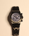 Bartlett 1954 Serov Pro II chronograph, black case and bracelet with a blue textured dial, front view