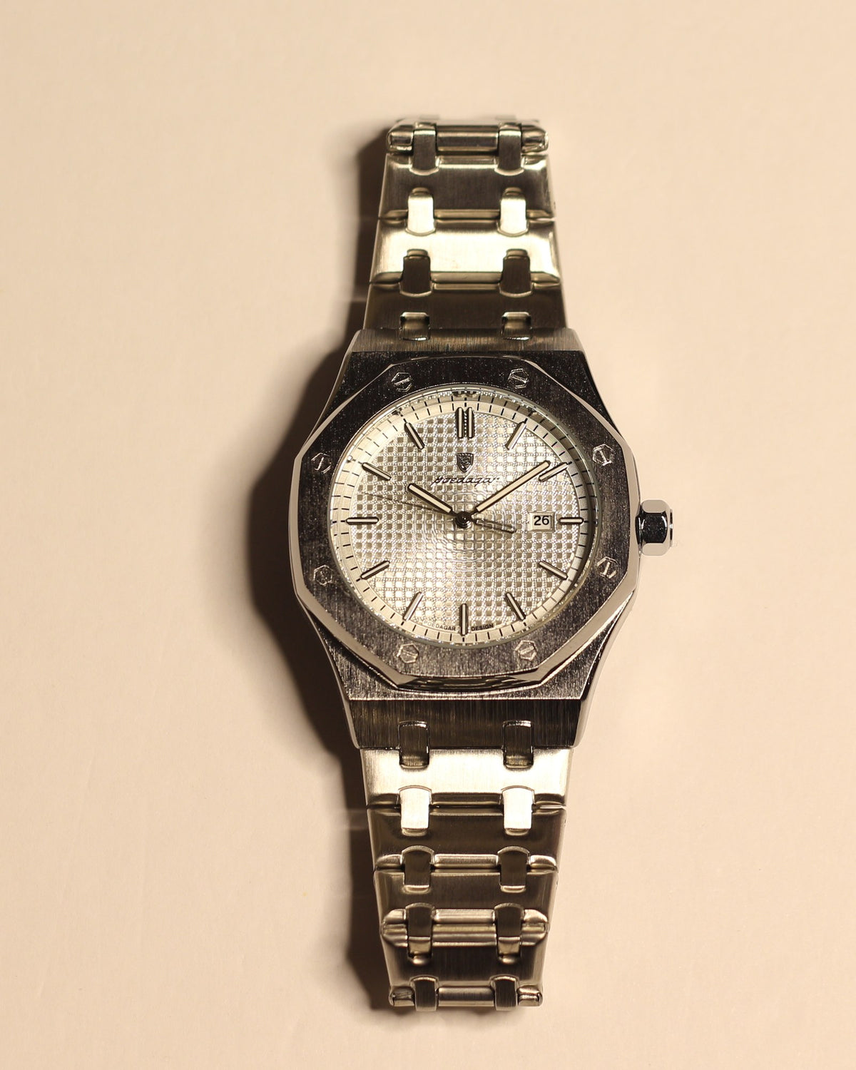 Bartlett 1954 Serov, silver octagonal case with a white textured dial, front view